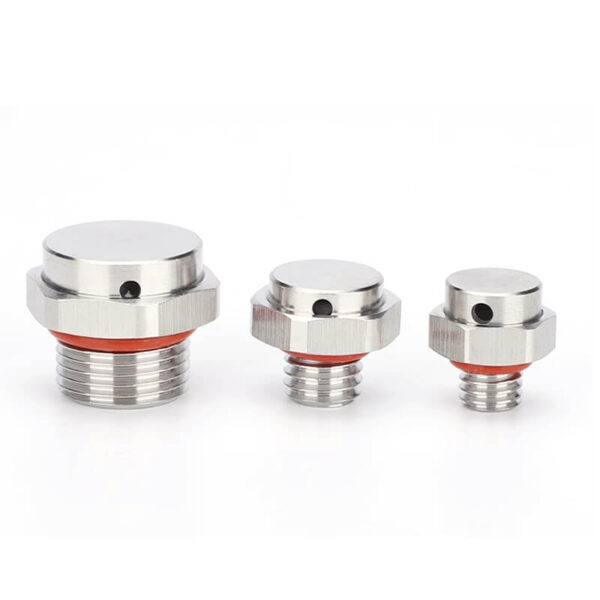 three metal vent plugs