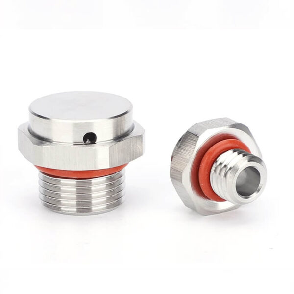 two metal vent plugs